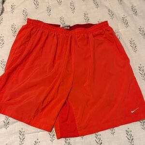 Nike youth boys XL orange/ Red Performance Running Shorts
